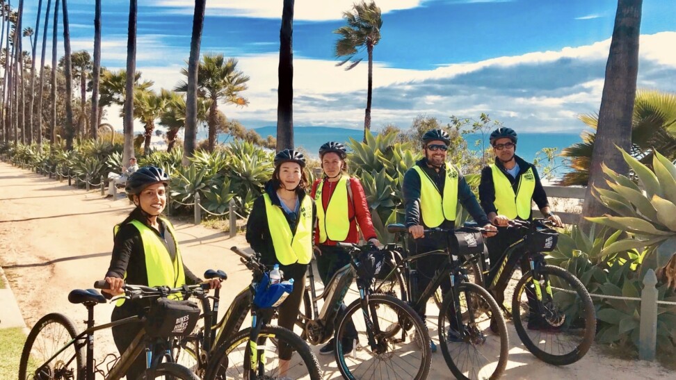 Cyclists along the beach in Los Angeles, California