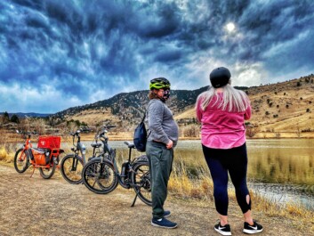 Two women admire the mountains in Boulder, Colorado