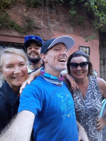 A group of friends smile for a selfie