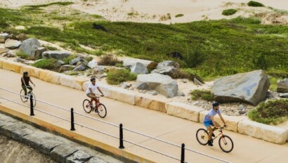 Riding along the beach in Newcastle, Australia