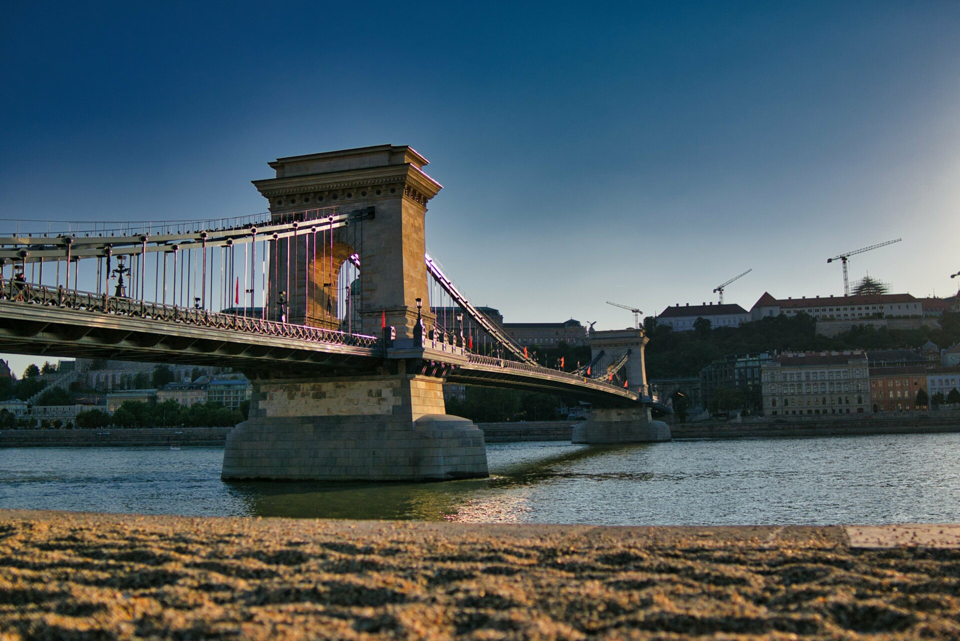 Szechenyi Lanchid Bridge over the Danube River in Budapest, Hungary.
